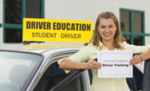 A woman holding a paper with the text “driver training”