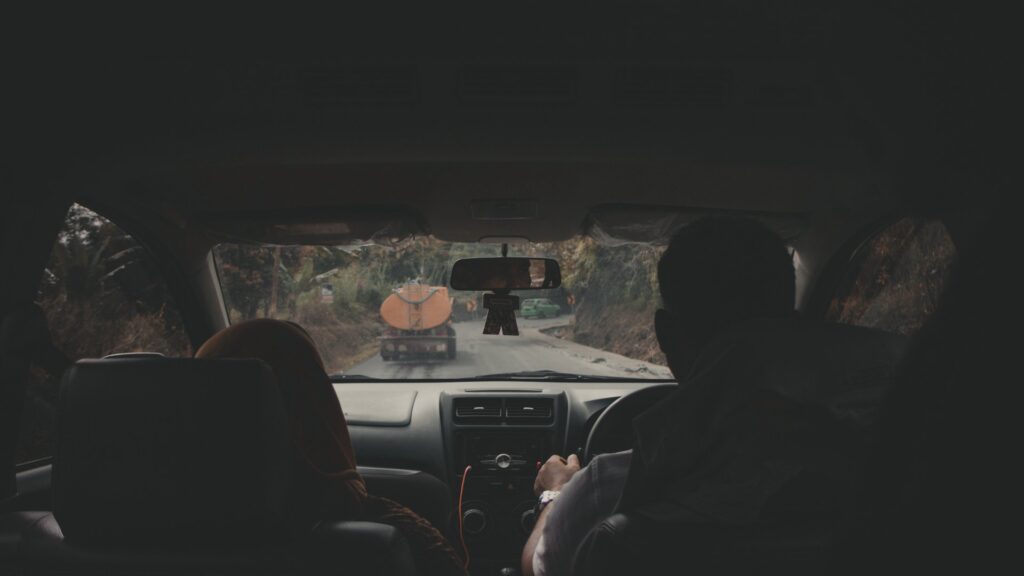 A man driving through the mountains